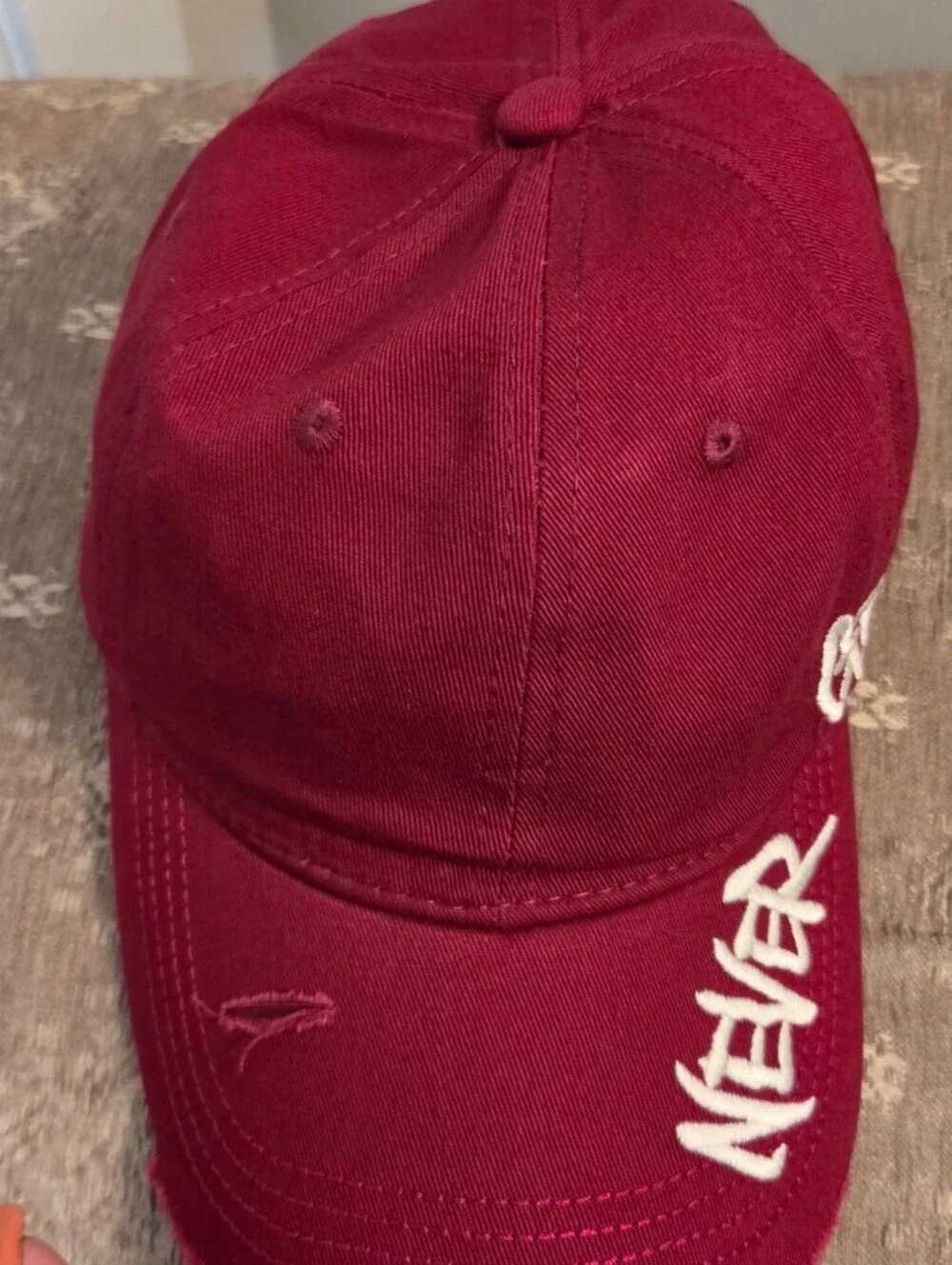 Maroon Baseball Cap with 'Never Give Up' Embroidery